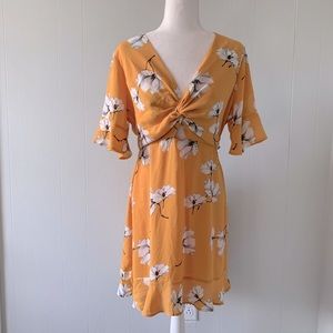 FRANCESCA’S floral cut out ruffled dress